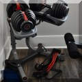 X04. Bowflex SelectTech dumbbells and stand. 